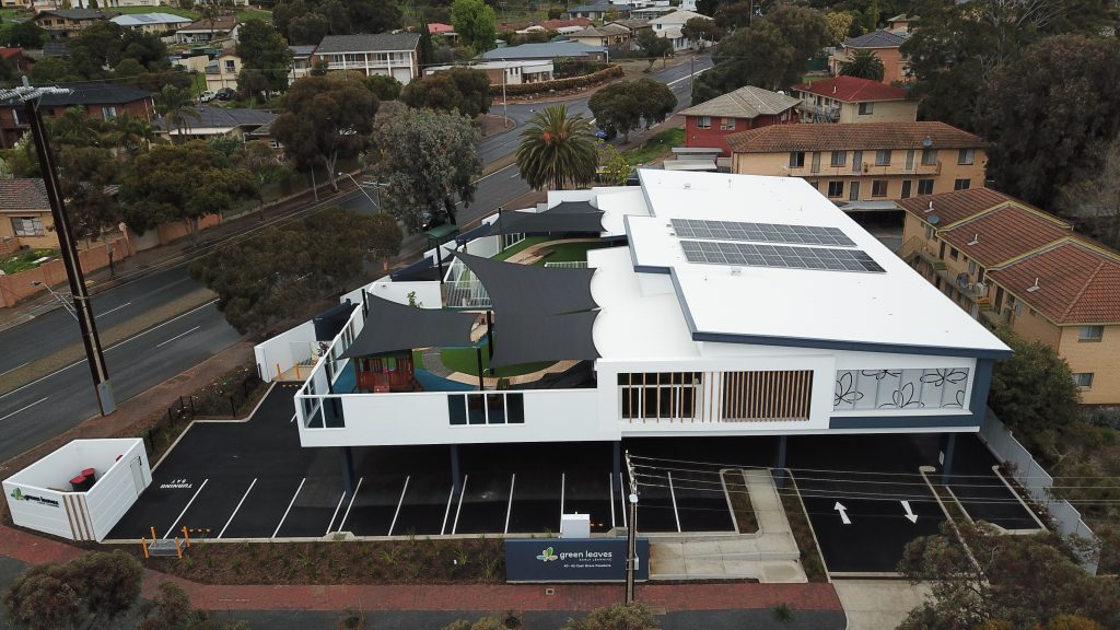 Green Leaves Early Learning Top Front Overview of the Building with Solar Panel Rooftop