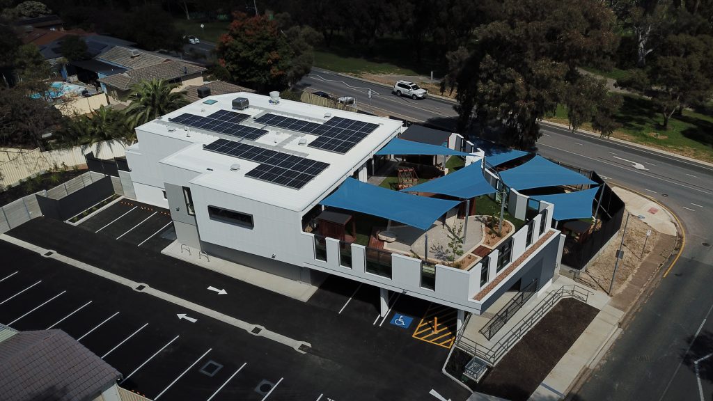Nido Early School Top Left View of the Building with Solar Panel Rooftop